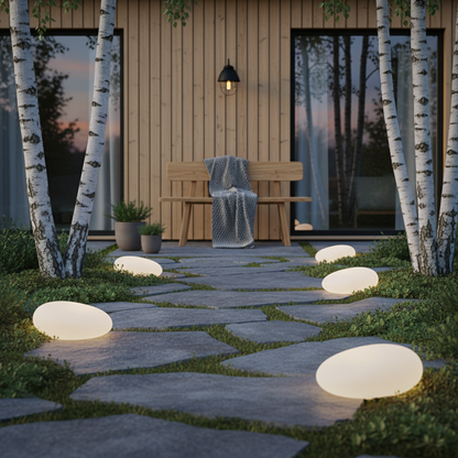 Cosma — Solar Glow Garden Pebble Light